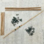 Several bamboo sticks and plastic clips